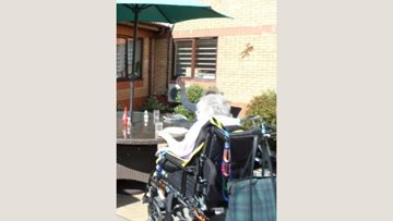 Ammanford care home enjoy a sunny day with BBQ